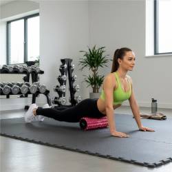 Rola pentru masaj si stretching din spuma EVA, duritate medie 55 Shore A, 33x13 cm, roz